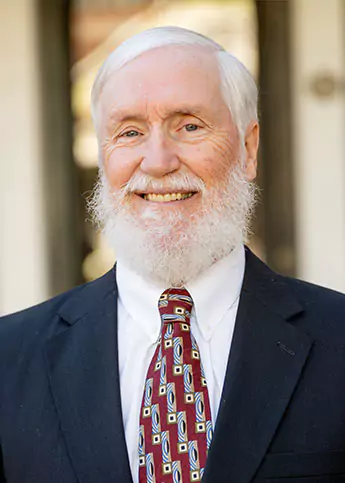 A portrait of Georgia disability lawyer Kent Silver, co-founder of Silver & Archibald, smiling for the camera.
