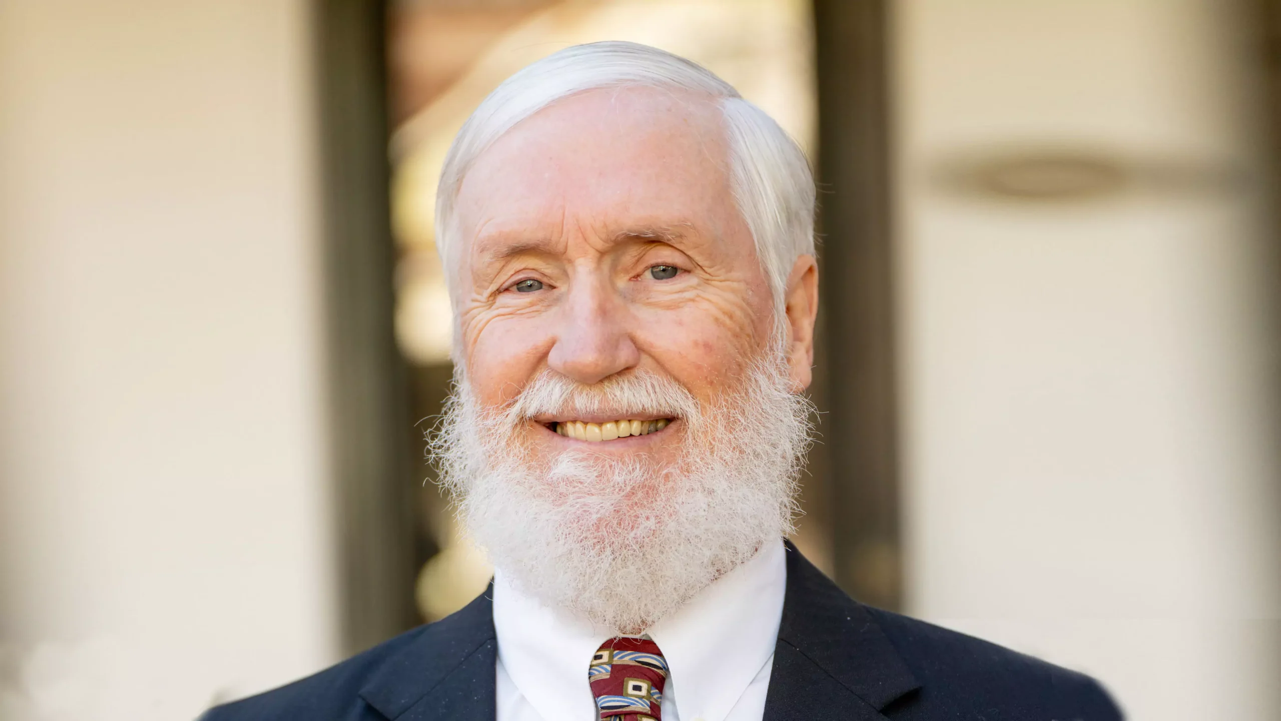 A portrait of Georgia disability lawyer Kent Silver, co-founder of Silver & Archibald, smiling for the camera.